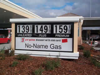 Picture of gas station pricing sign.