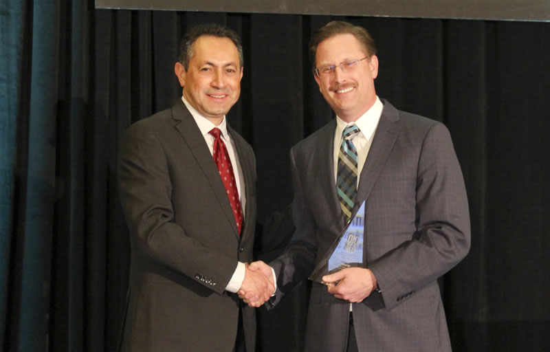 Tim Dupuis accepting CIO of the Year Award
