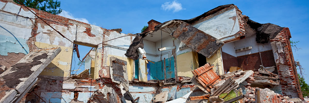 Photograph of eathquake damaged residence.