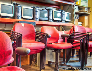 Photo of computers and chairs.