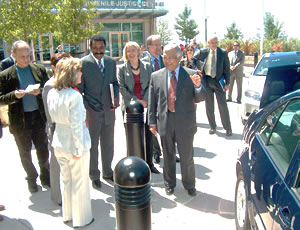 Senator Barbara Boxer learns about the County's waste-vegetable-oil-powered car from General Services Agency Director Aki Nakao during her tour of the Juvenile Justice Center. Photo credit: Rahman Batin