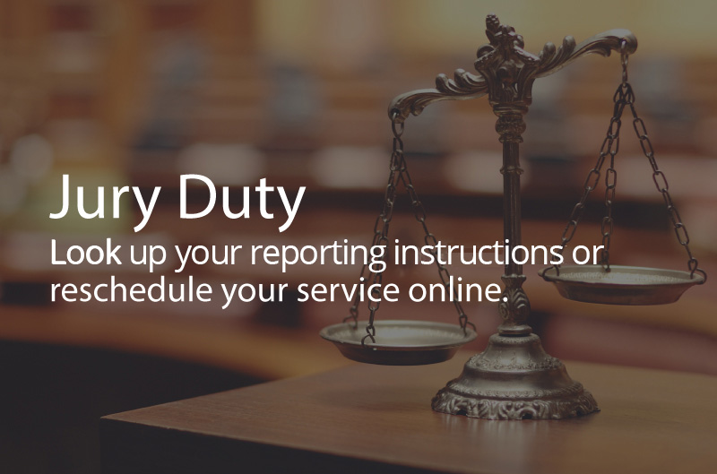 Photo the scales of justice in a courtroom. Caption: Jury Duty. Look up your reporting instrctions or reschedule your service online.