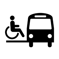 Person in a wheelchair loading into a van