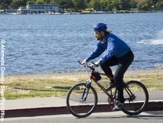 Photo of a County employee biking to work.