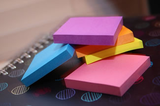 small, brightly colored post-it notepads. credit: Taking Notes by venspired, on Flickr